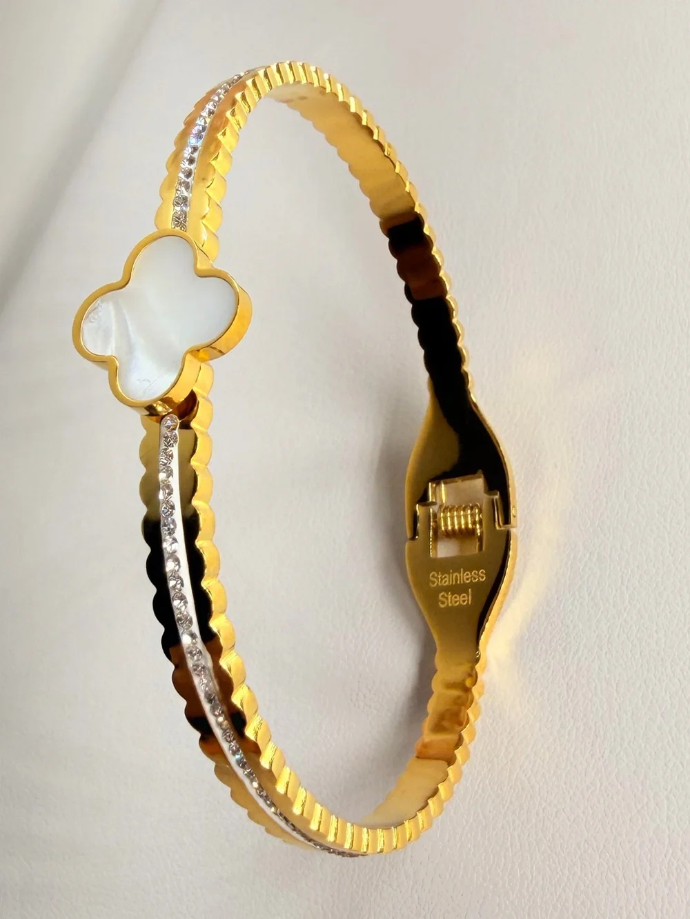 Stainless steel Gold Bangle Bracelet with White Mother-of-Pearl Clover Accent